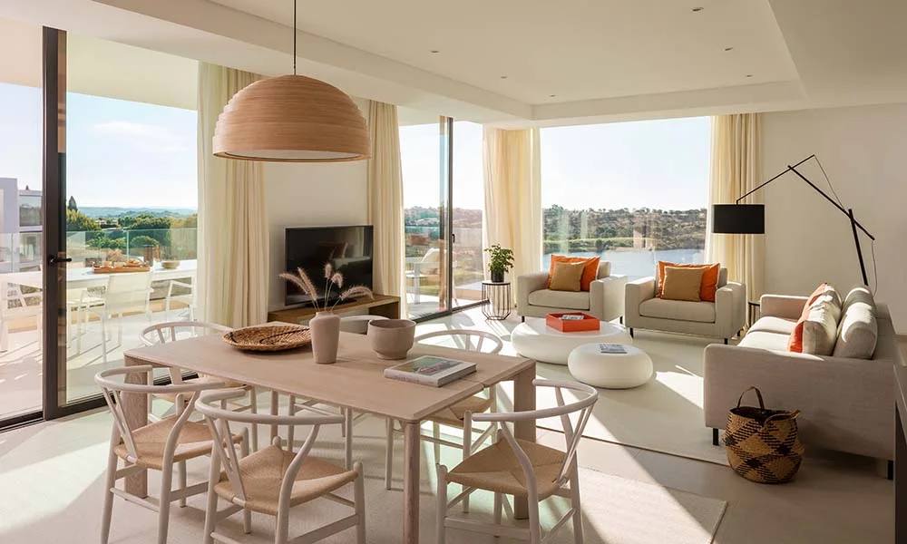Bright open-plan living and dining room in a Clubhouse Residence